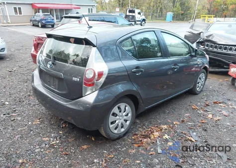 2014 Toyota Prius C Two z USA, uszkodzony, nr VIN JTDKDTB37E1568866